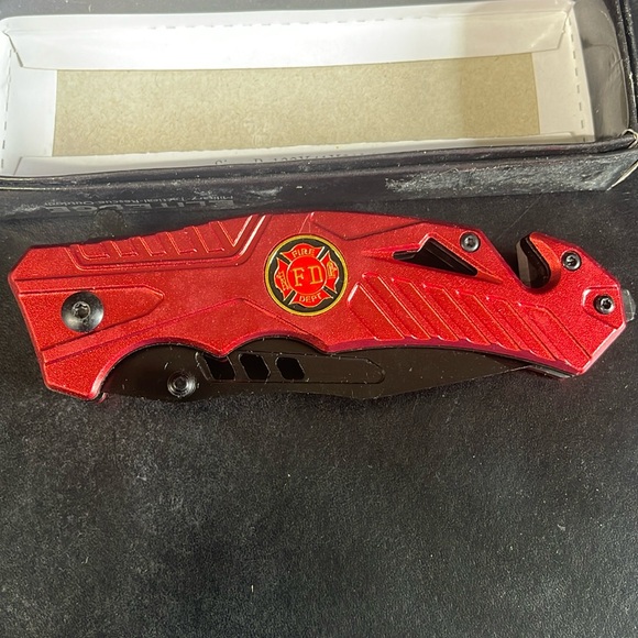 Other - New Fire fighter knife with seatbelt cutter and glass breaker